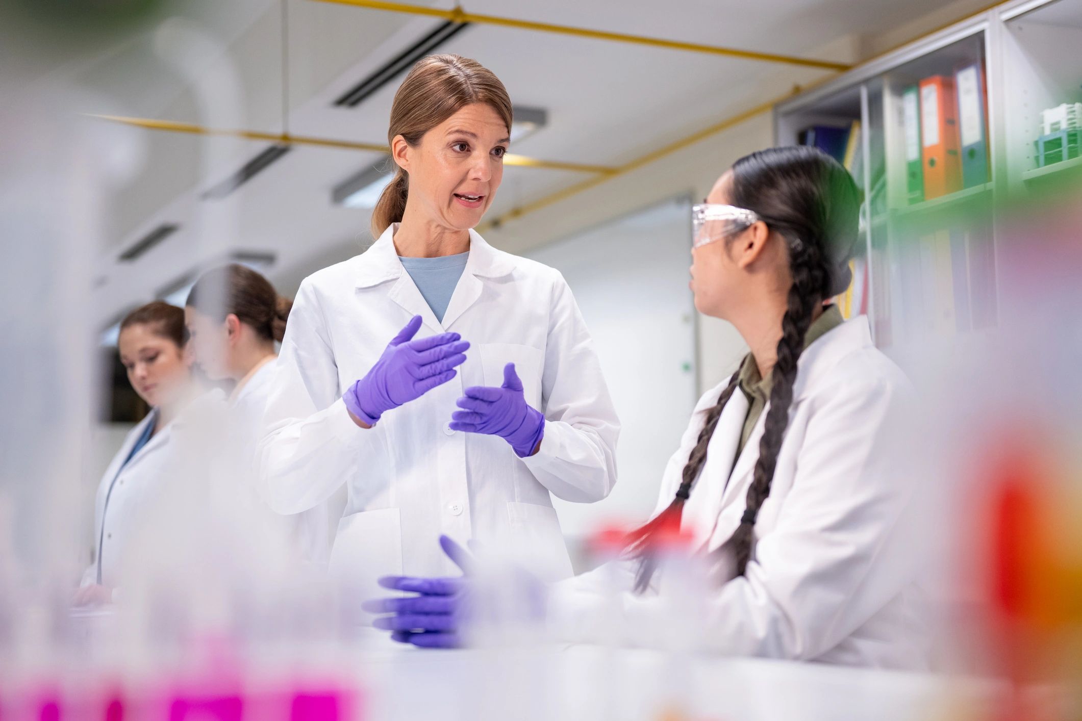 Scientists collaborating in a laboratory